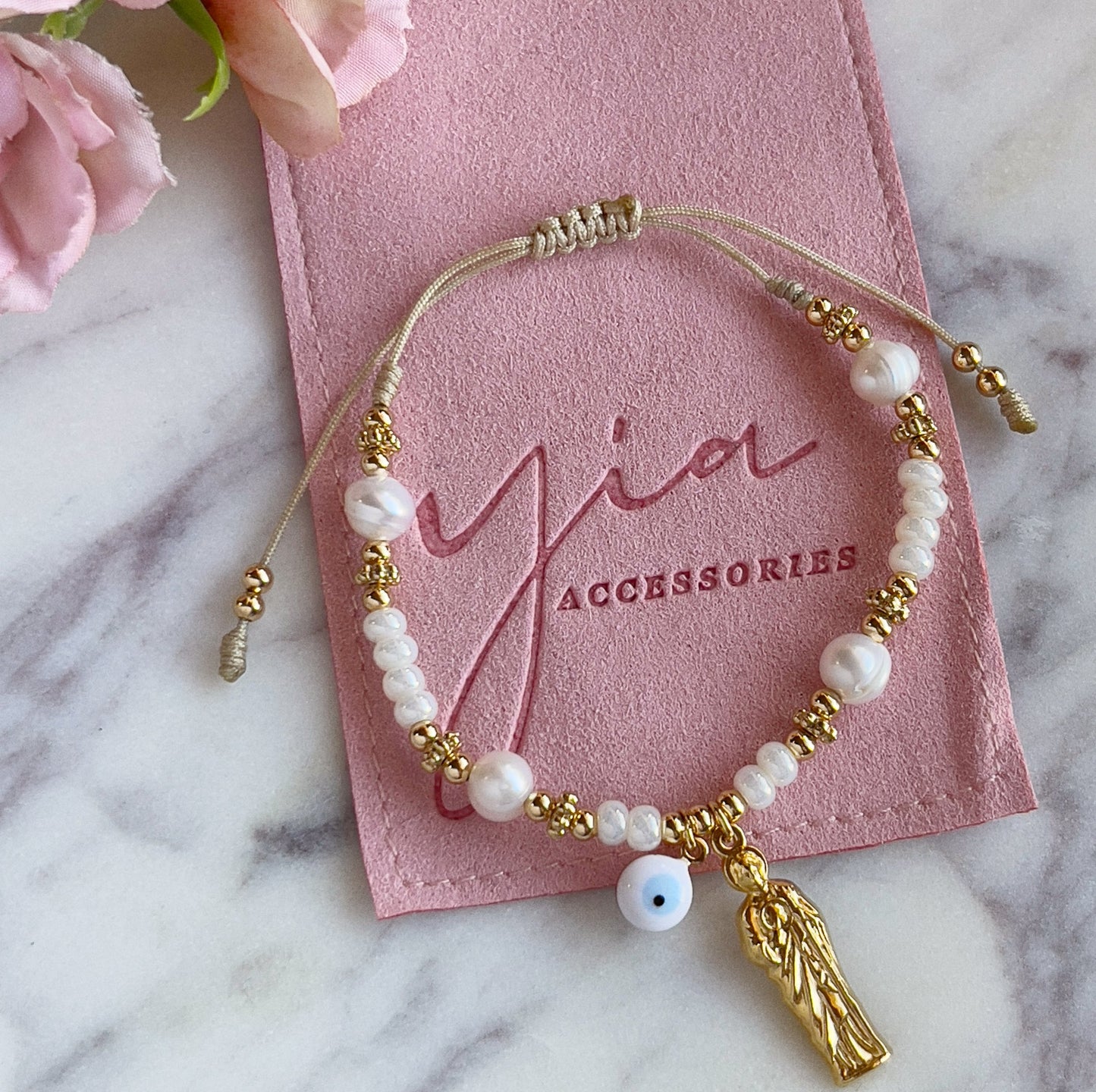 Pearl San Juditas Evil Eye bracelet