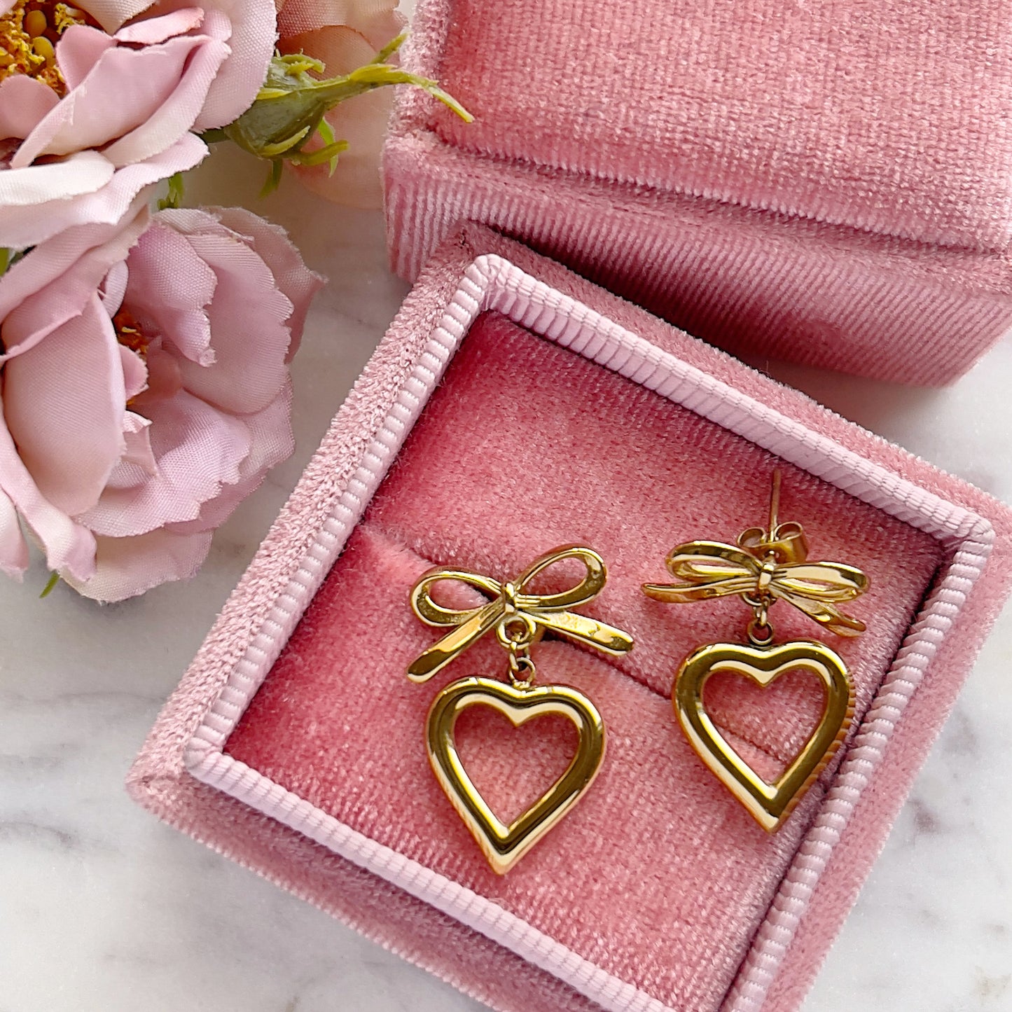 Bow corazón earrings +