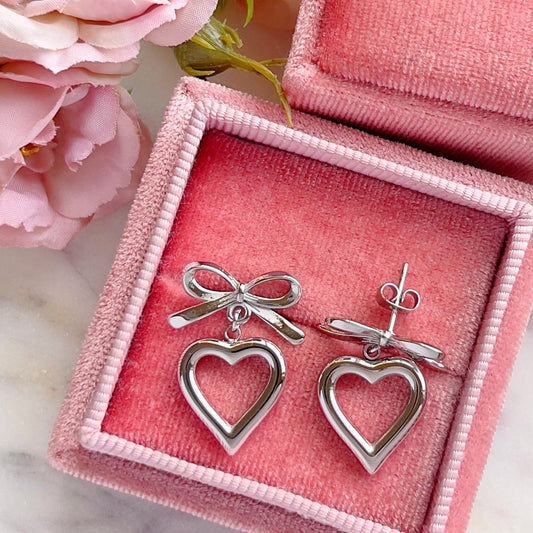 Bow corazón earrings +